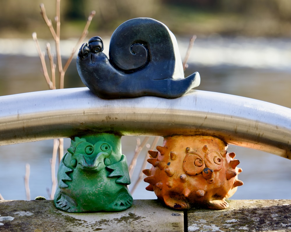 a couple of frogs in a sink