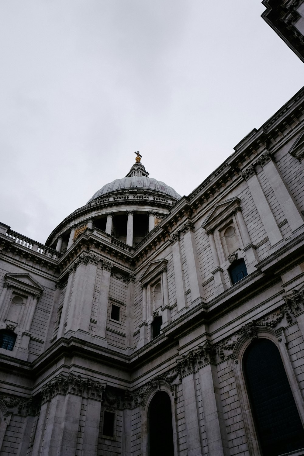 a building with a dome and a cross on top