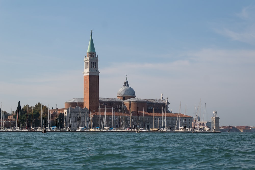 a building with a domed roof by the water