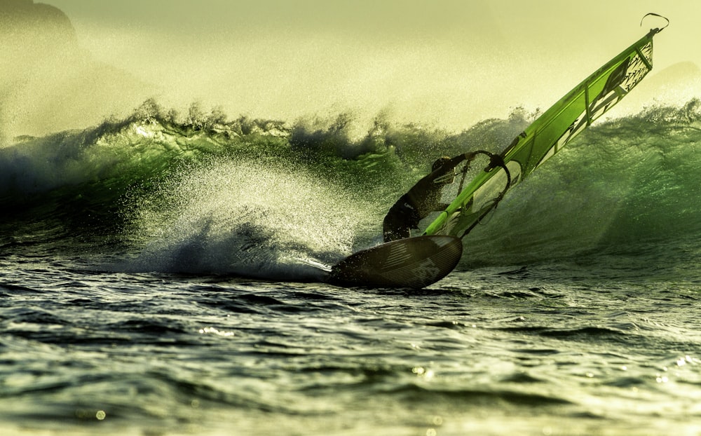 a person surfing on the waves