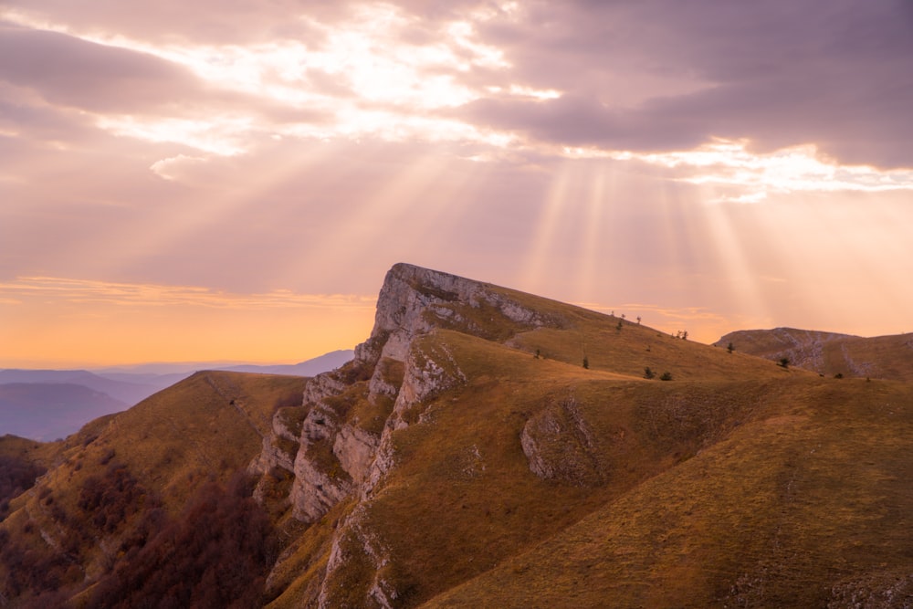 a group of people walking up a mountain