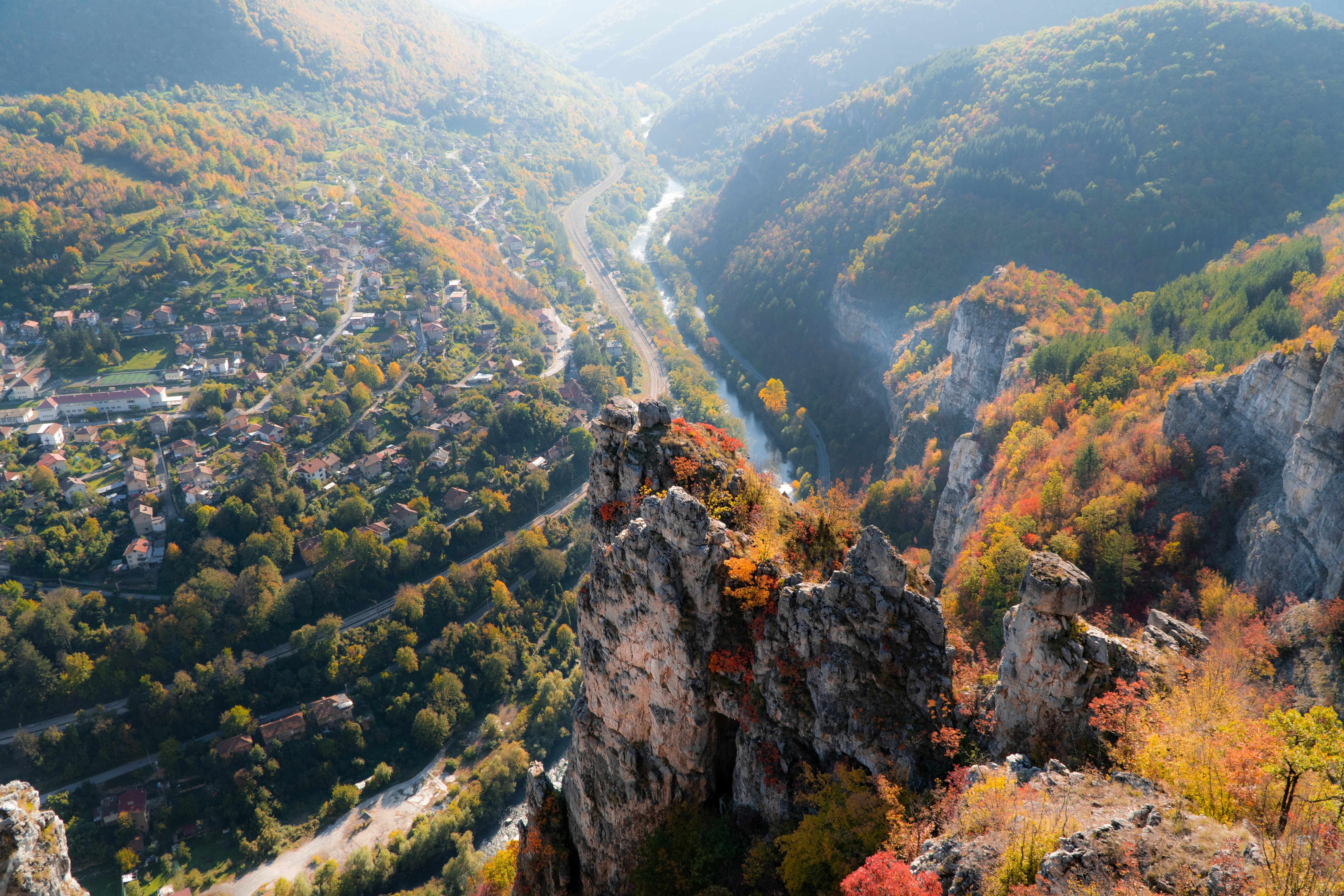 a winding road through a valley