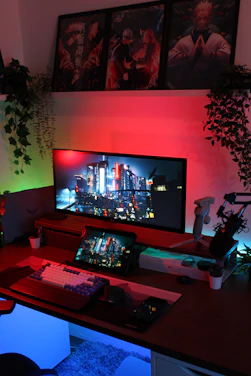 Futuristic neon-lit gaming setup with anime posters and glowing blue and purple accents.