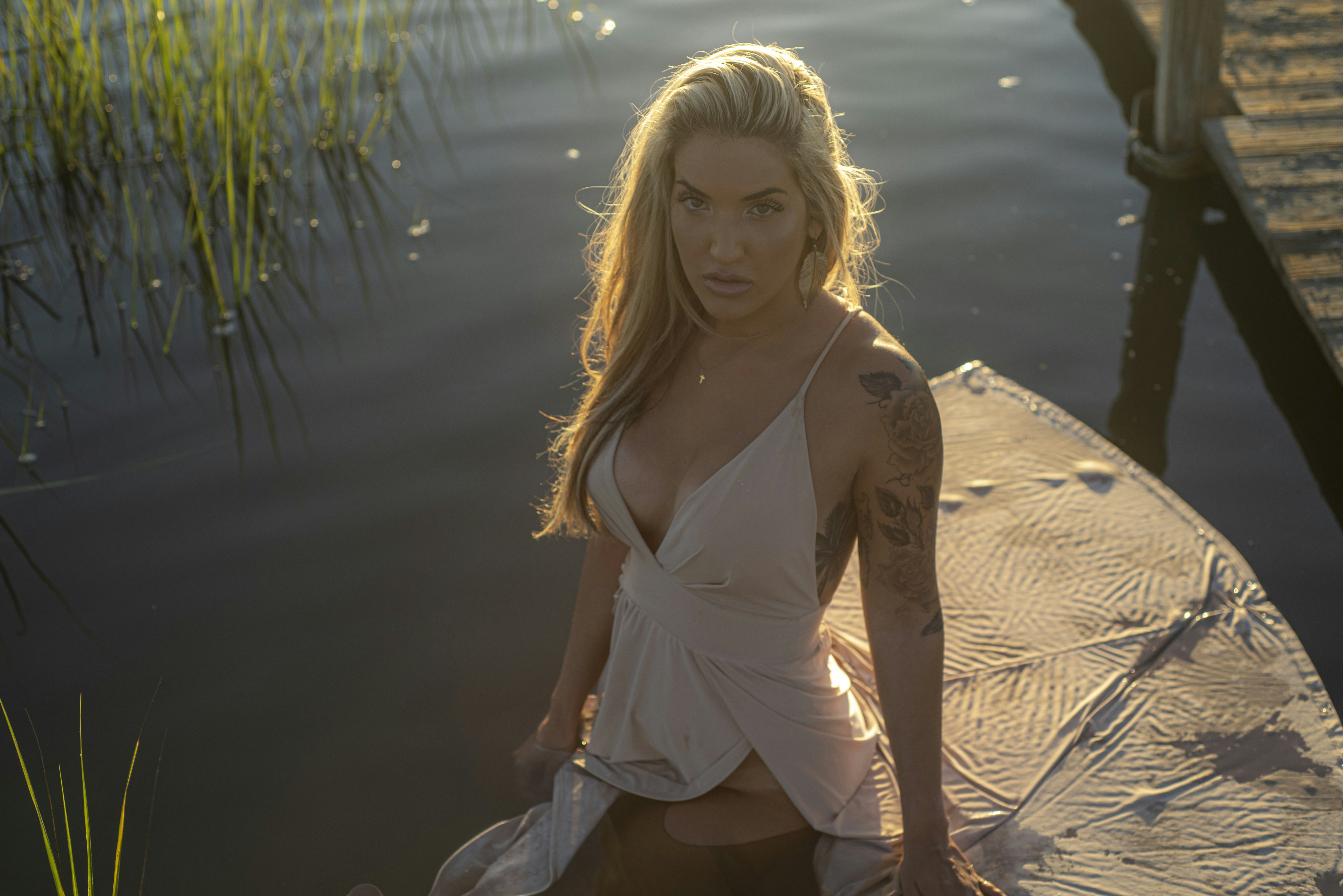 a woman sitting on a beach