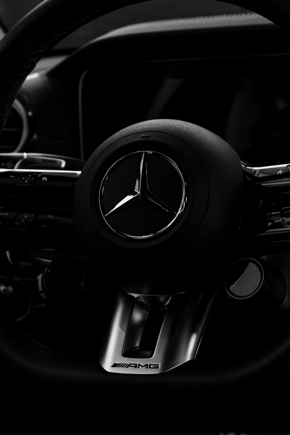 a steering wheel and dashboard of a car