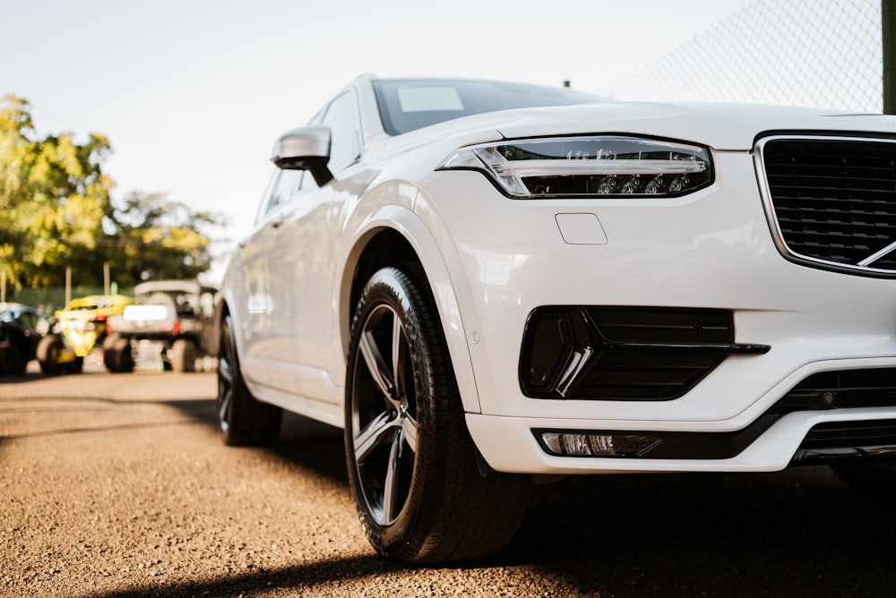 a white car parked on a road