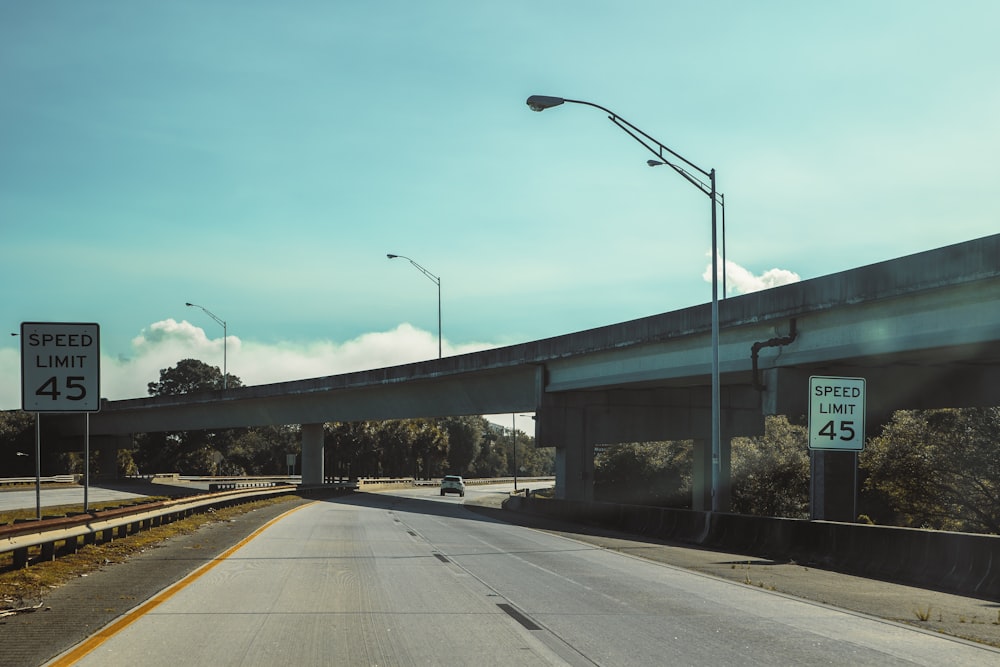 a road with a bridge over it