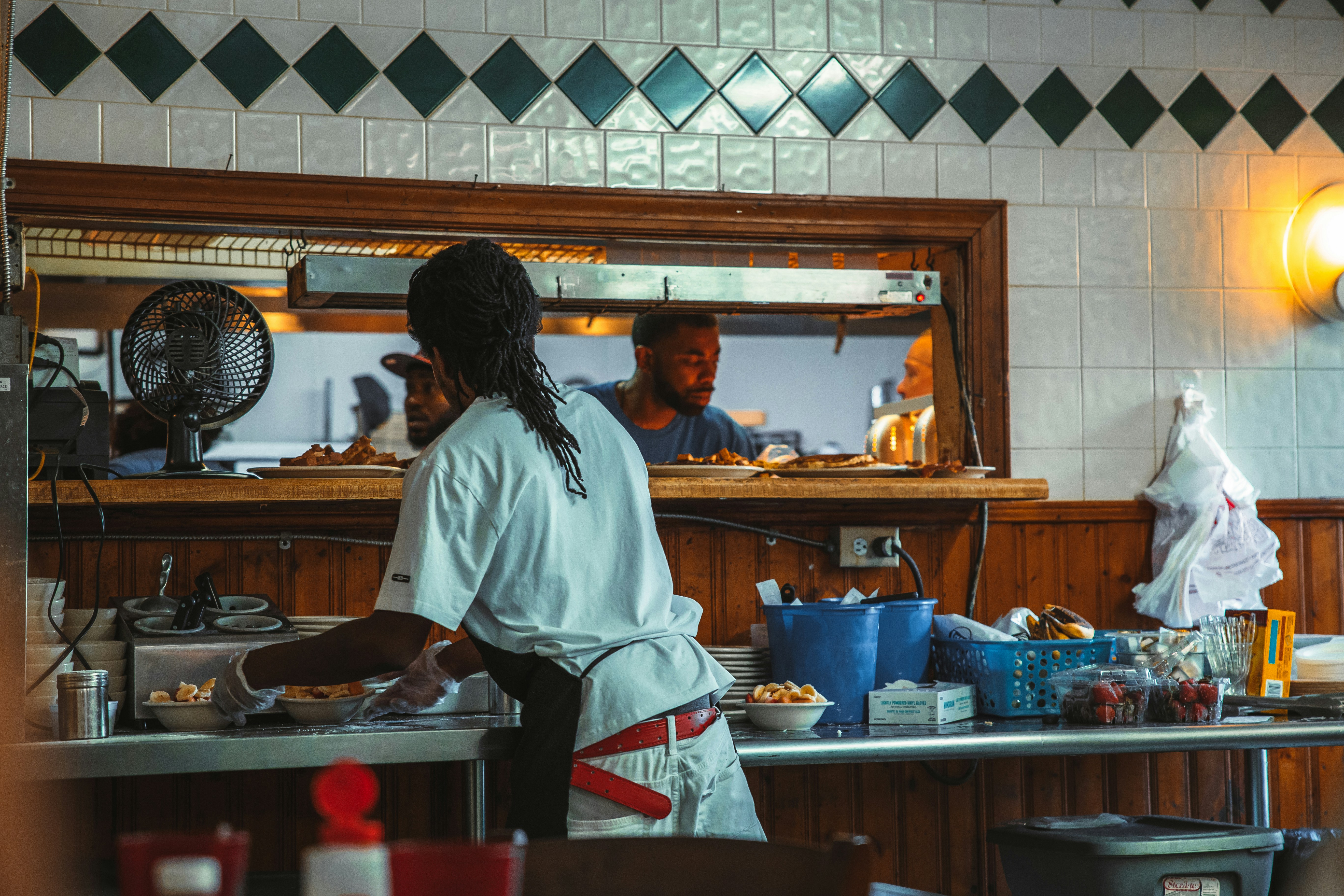 a person cooking in a kitchen, 