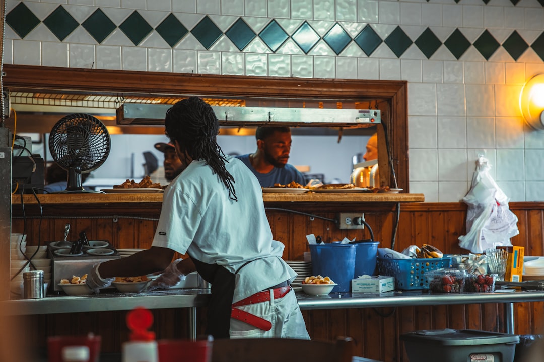 a person cooking in a kitchen,
