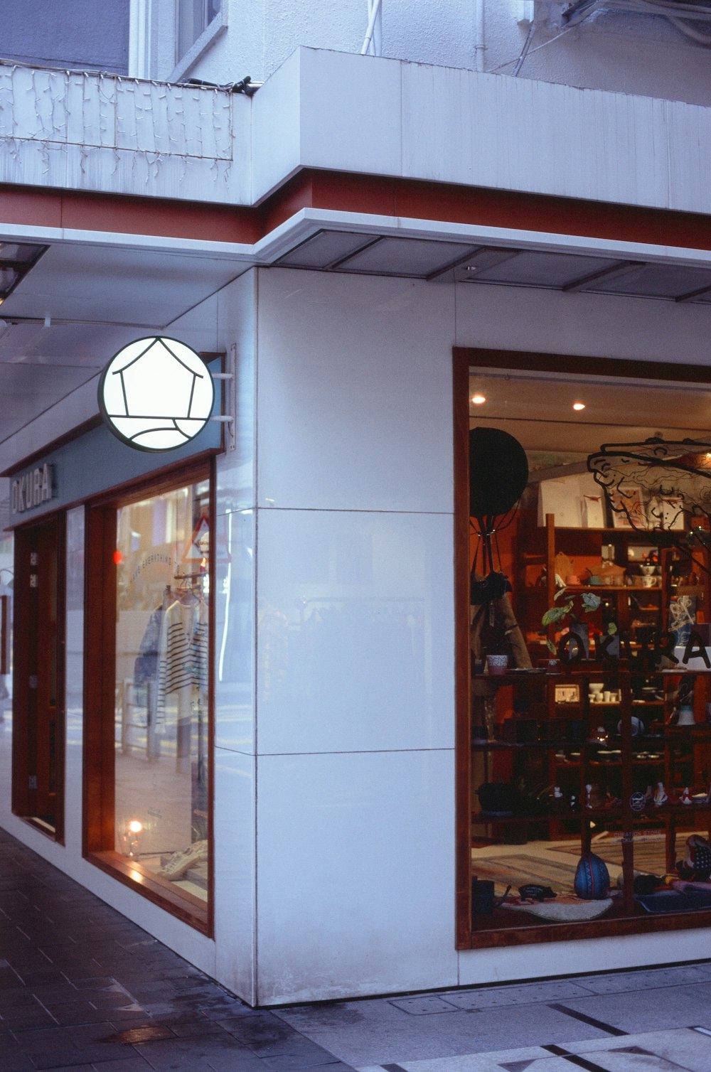 a store front with a white door