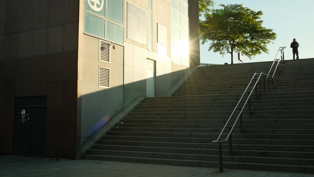 a person standing on a set of stairs