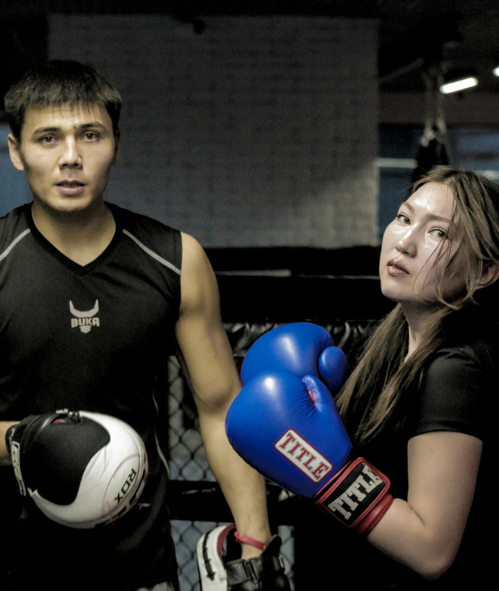 a man and woman holding balloons