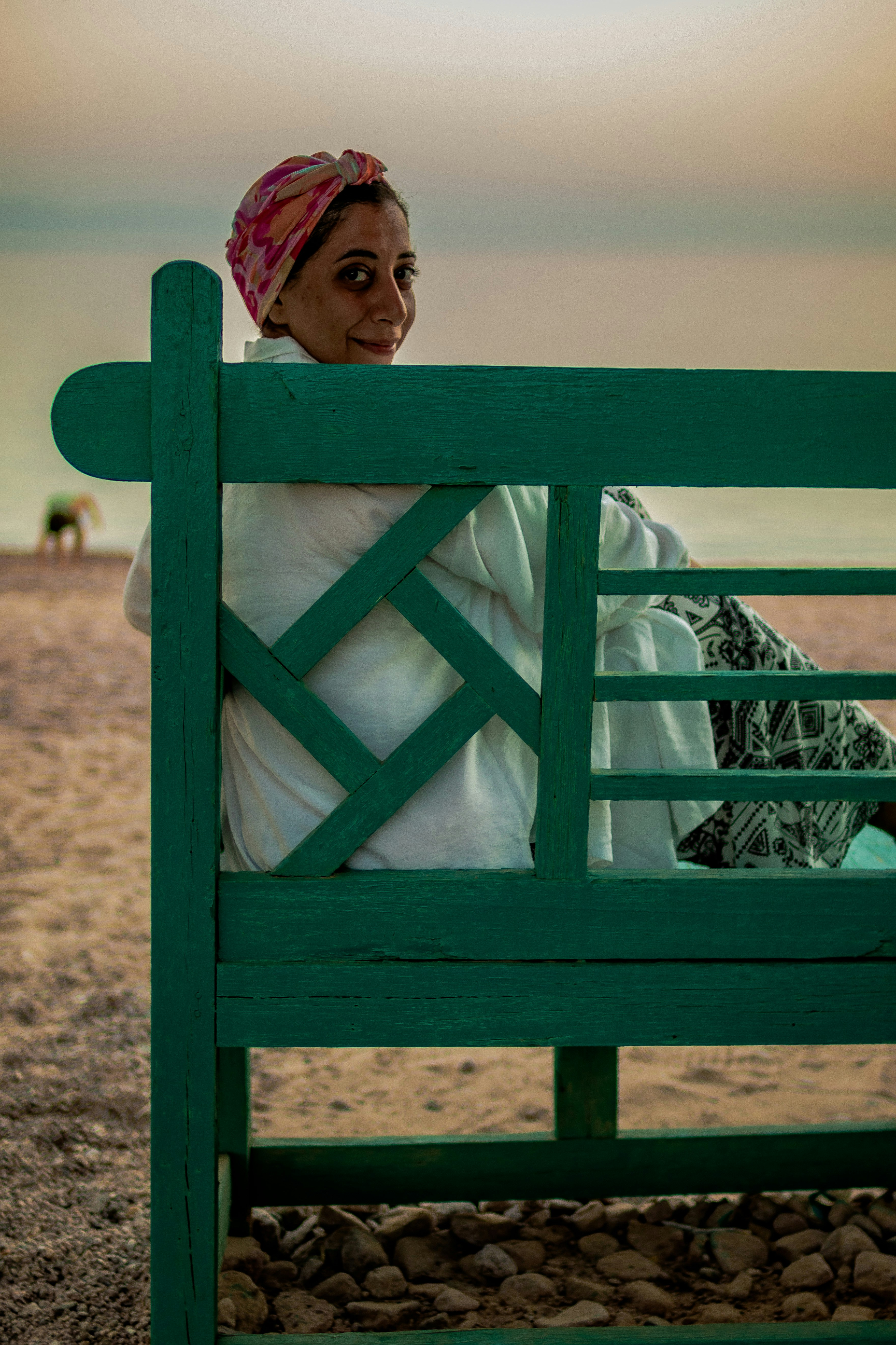 a person sitting on a bench