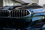 Stylish close-up of Chery Tiggo Cross headlights and grille.