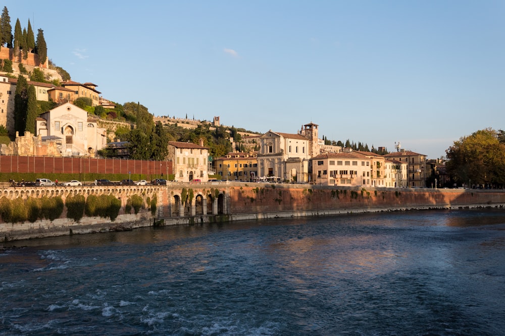 a body of water with buildings along it