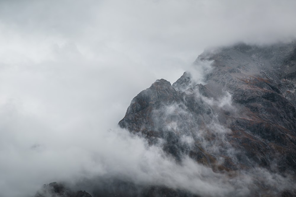 a mountain covered in clouds