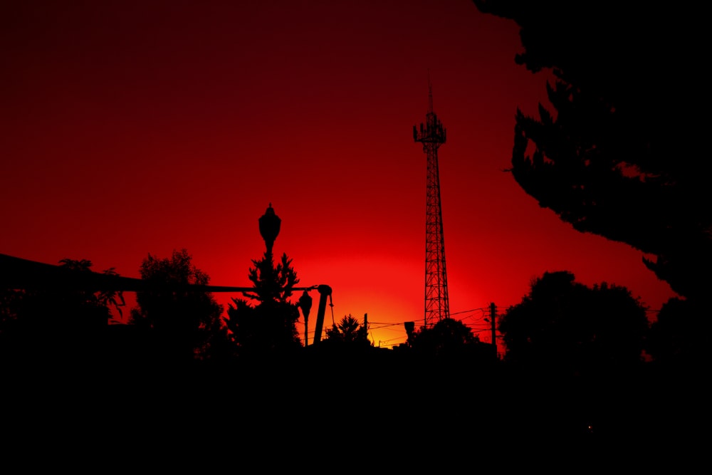 a silhouette of a tower