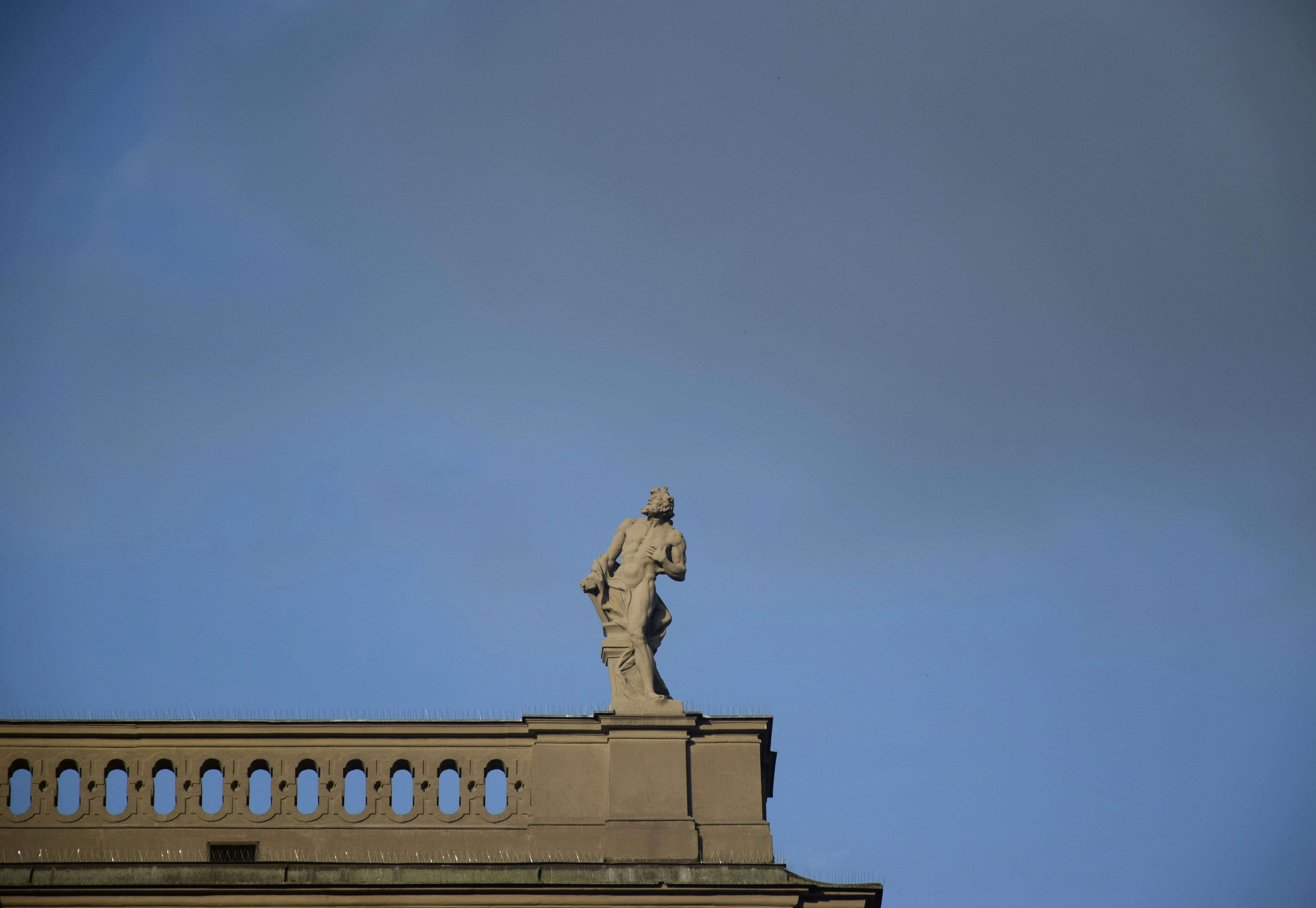 a statue on top of a building