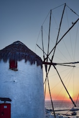 a boat with a straw roof