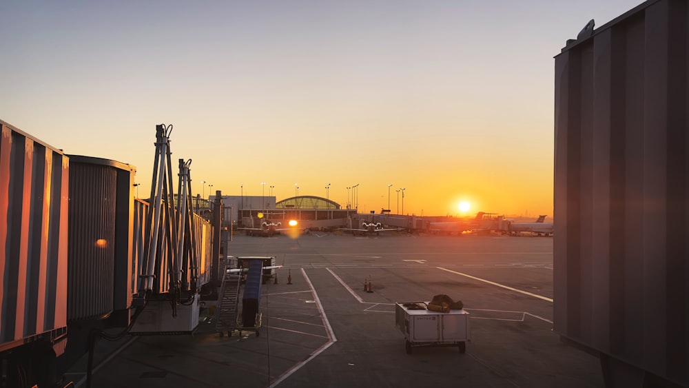 a sunset over a runway