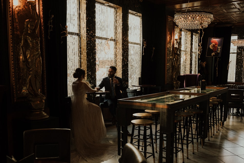 a bride and groom in a room