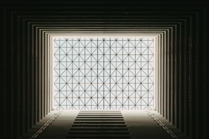 a dark room with a window