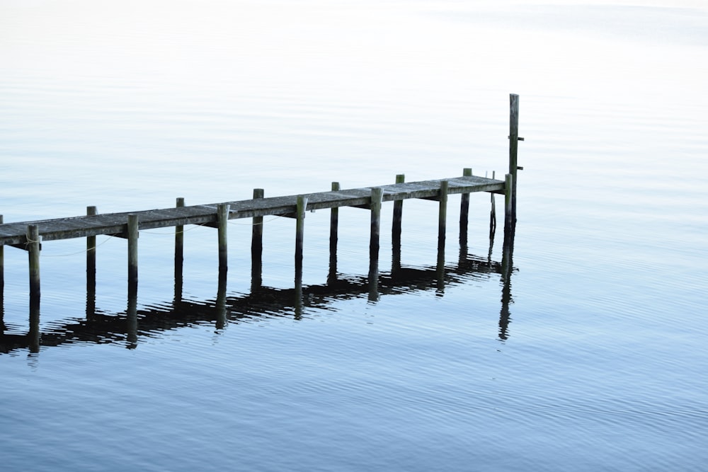 a wooden dock in the water