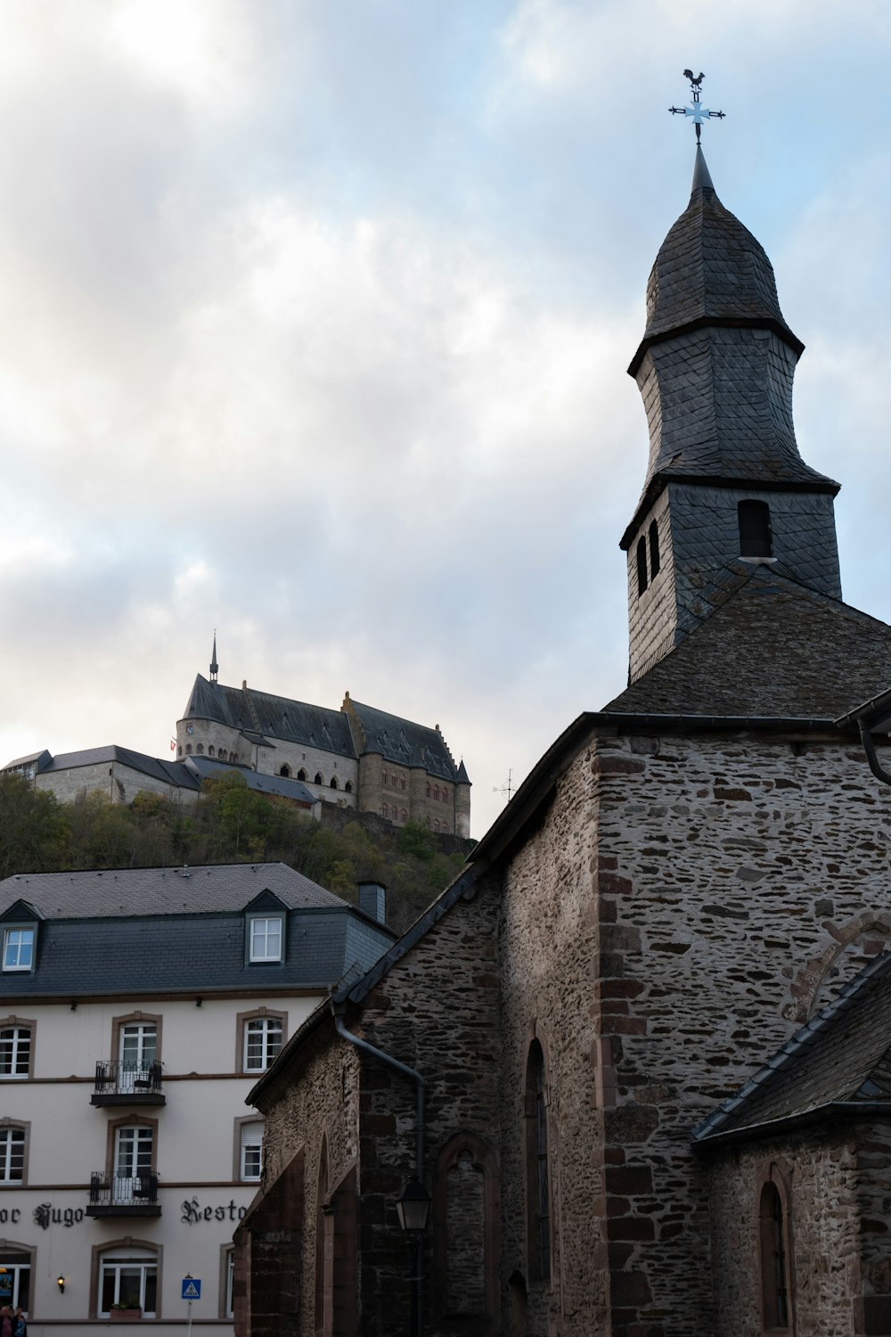 a stone building with a tower