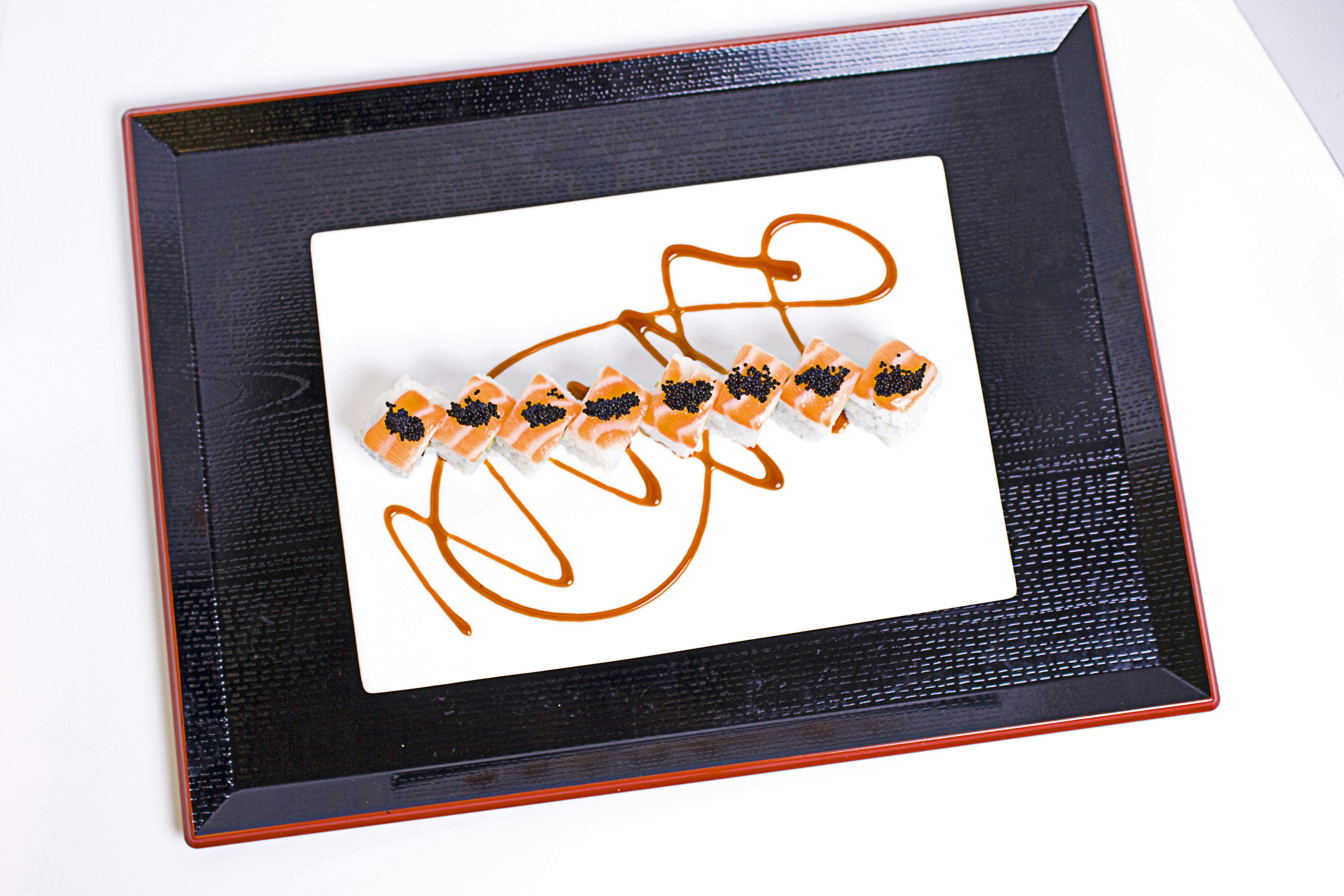 a black and brown box with a logo on it