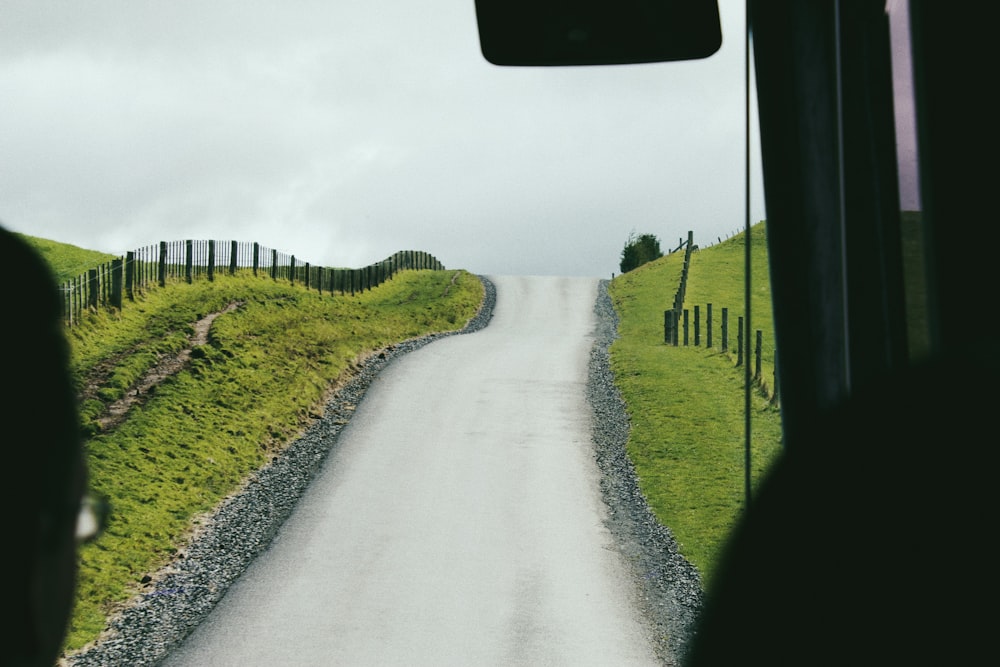 a road with grass on the side