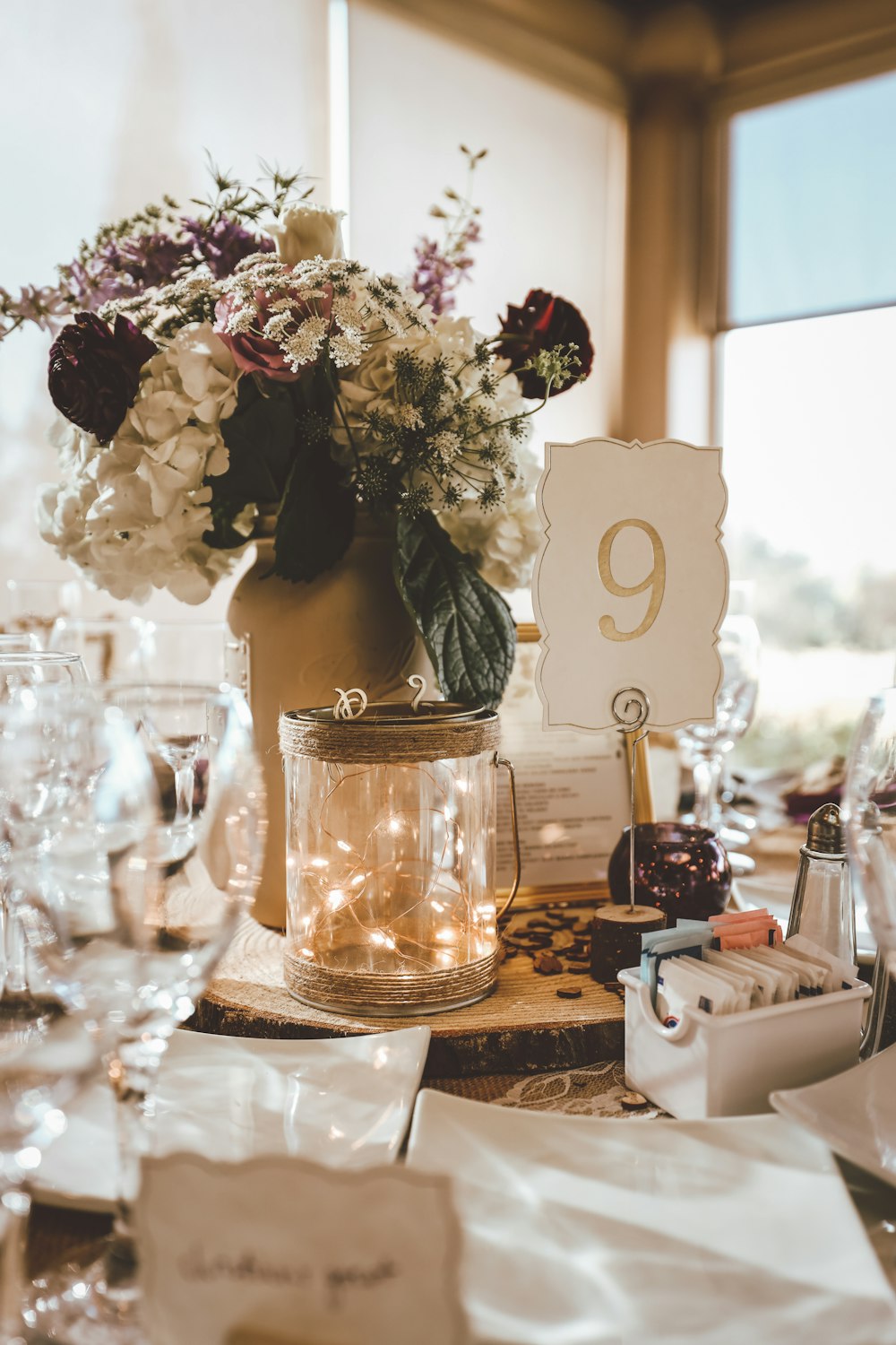 a vase with flowers on a table