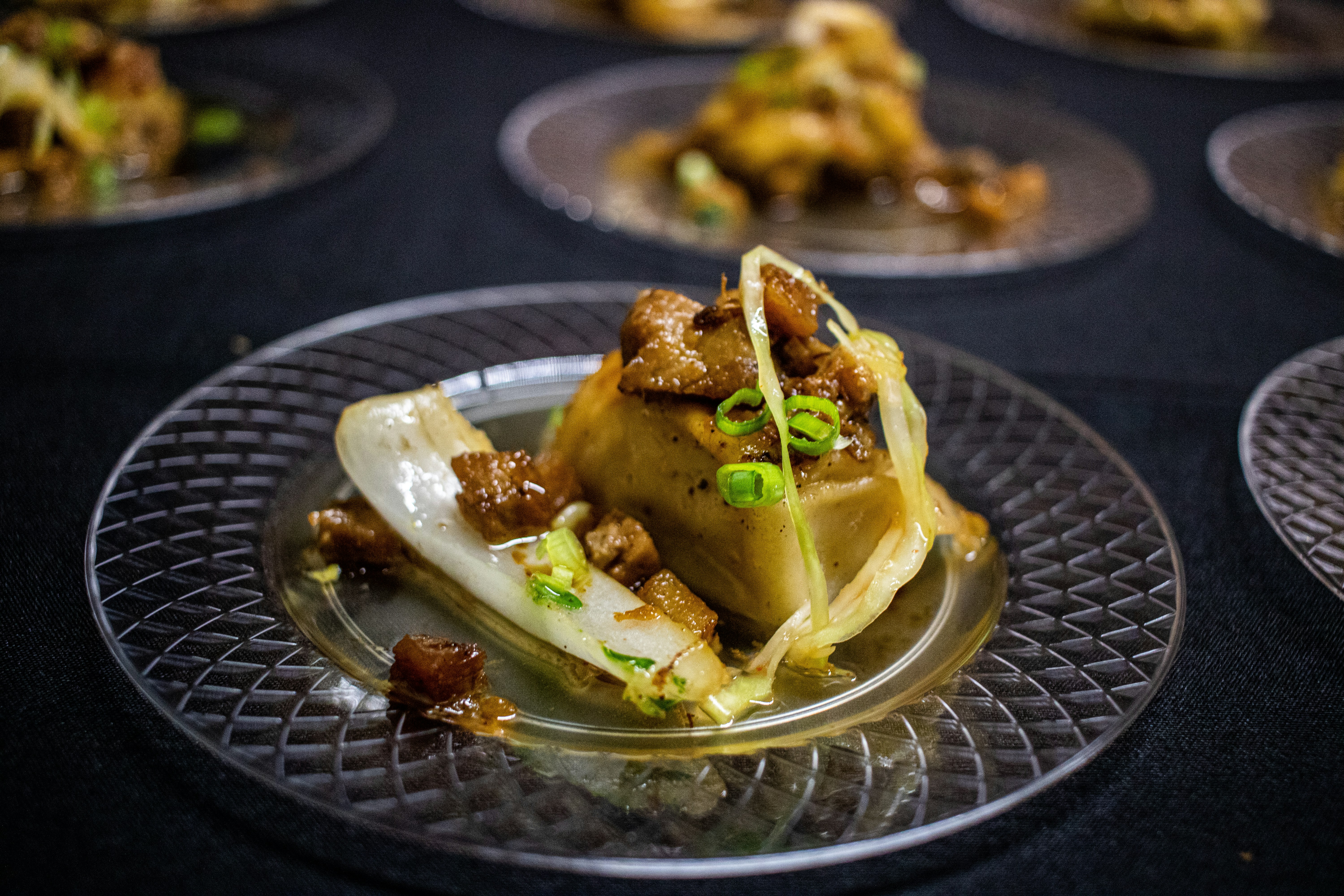 Plated dish on a glass plate