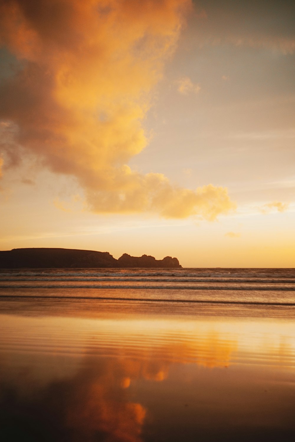 a sunset over a beach