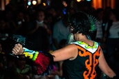 A vibrant photo capturing a performer wearing a finished costume mid-performance.