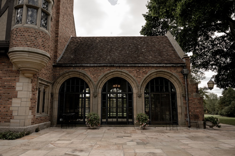 a brick building with a large arched doorway