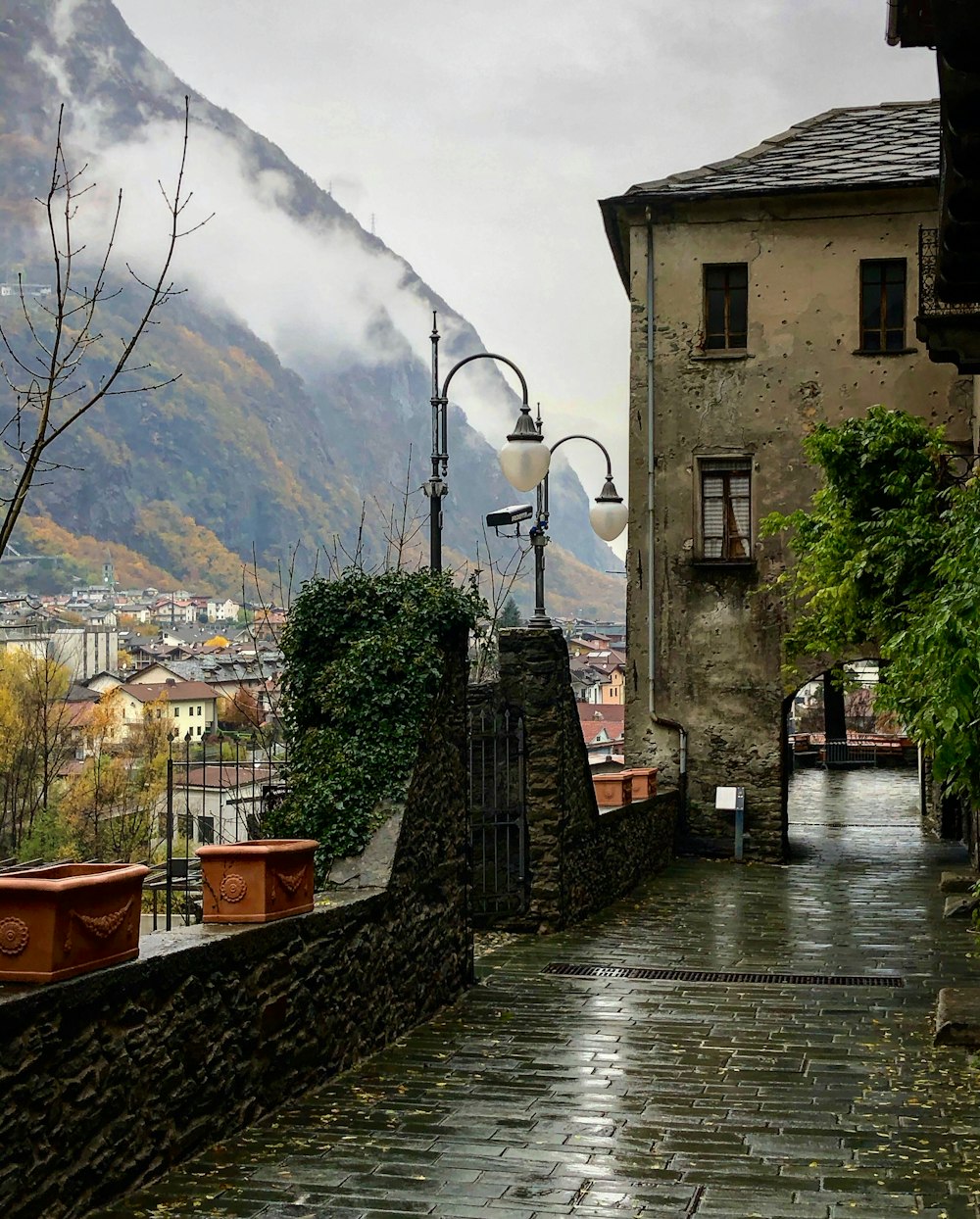 a waterfall over a stone building