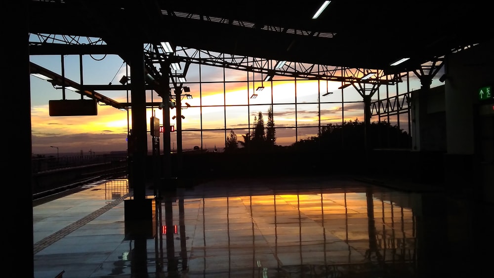 train tracks with a sunset in the background