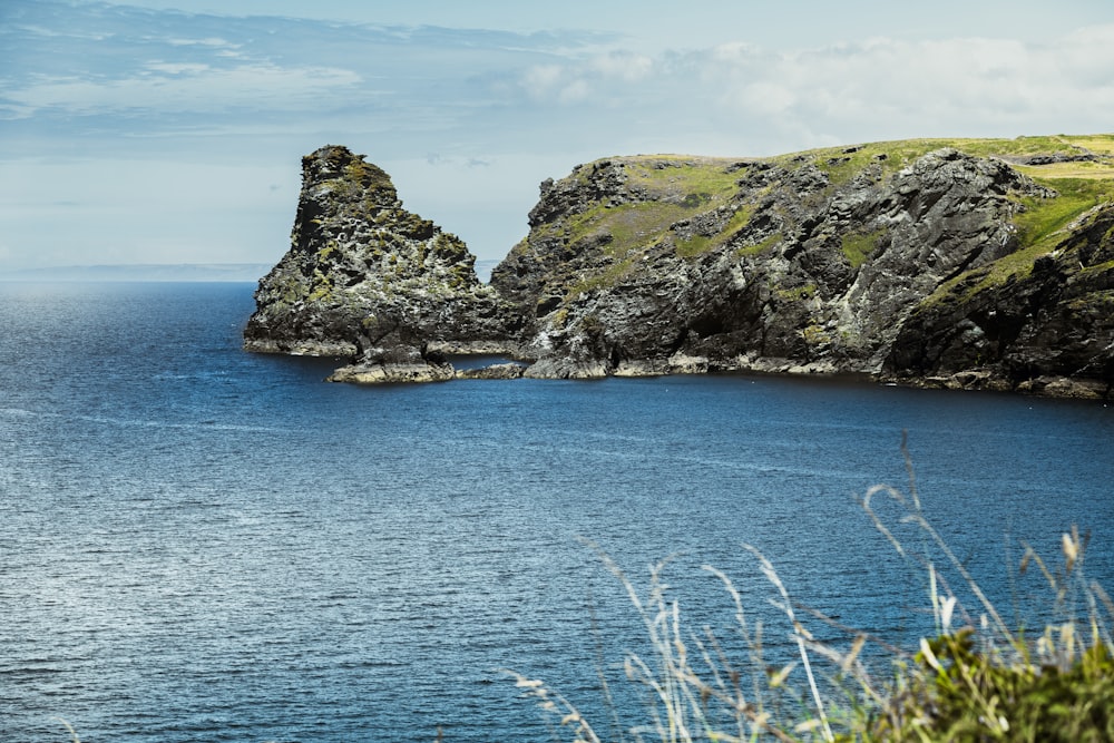 a rocky island in the ocean