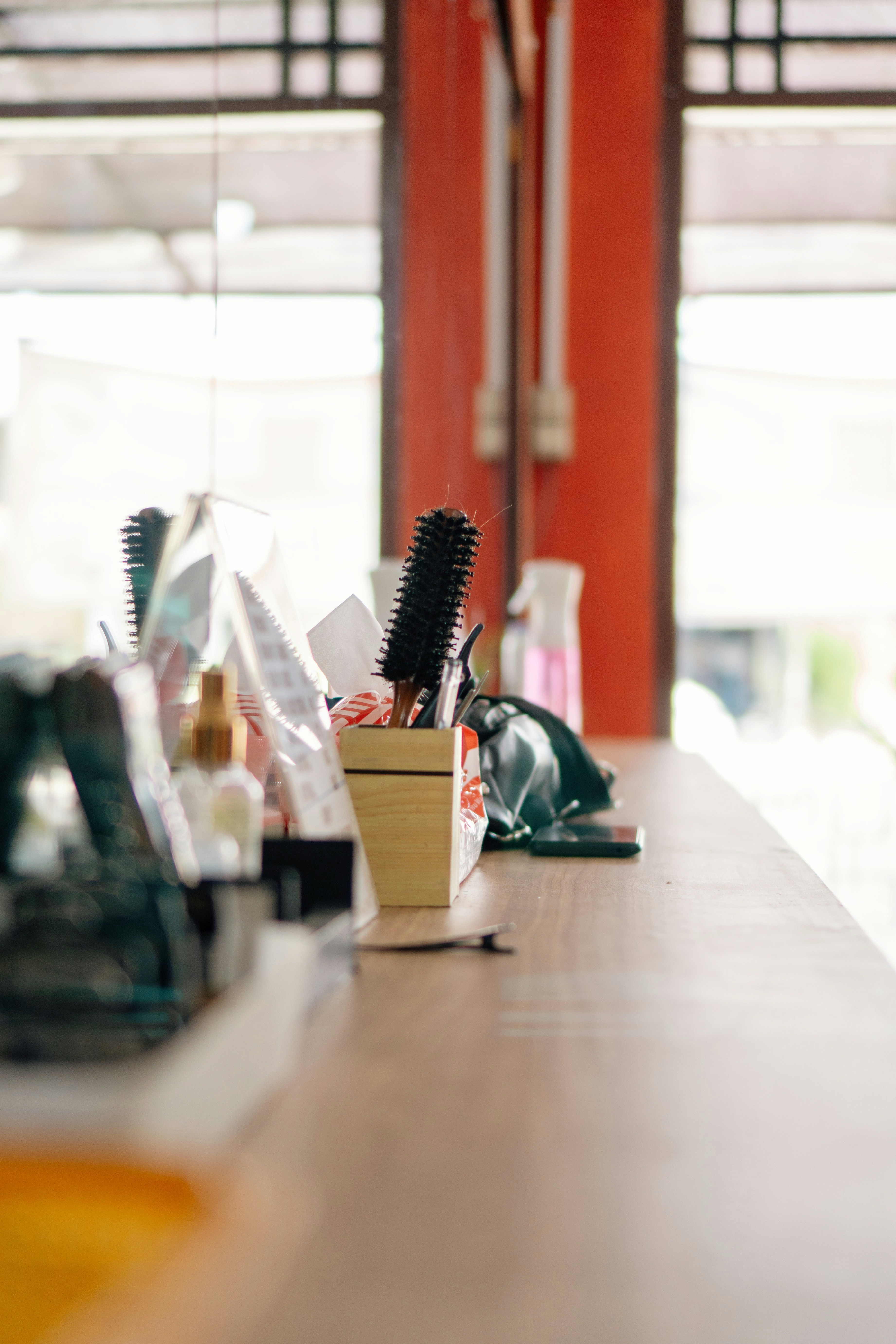 The elegant and dark interior of the barbershop.