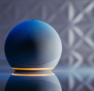 a blue ball on a black surface