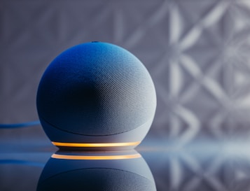 a blue ball on a black surface