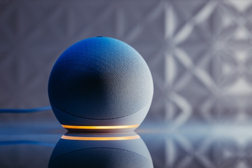 a blue ball on a black surface