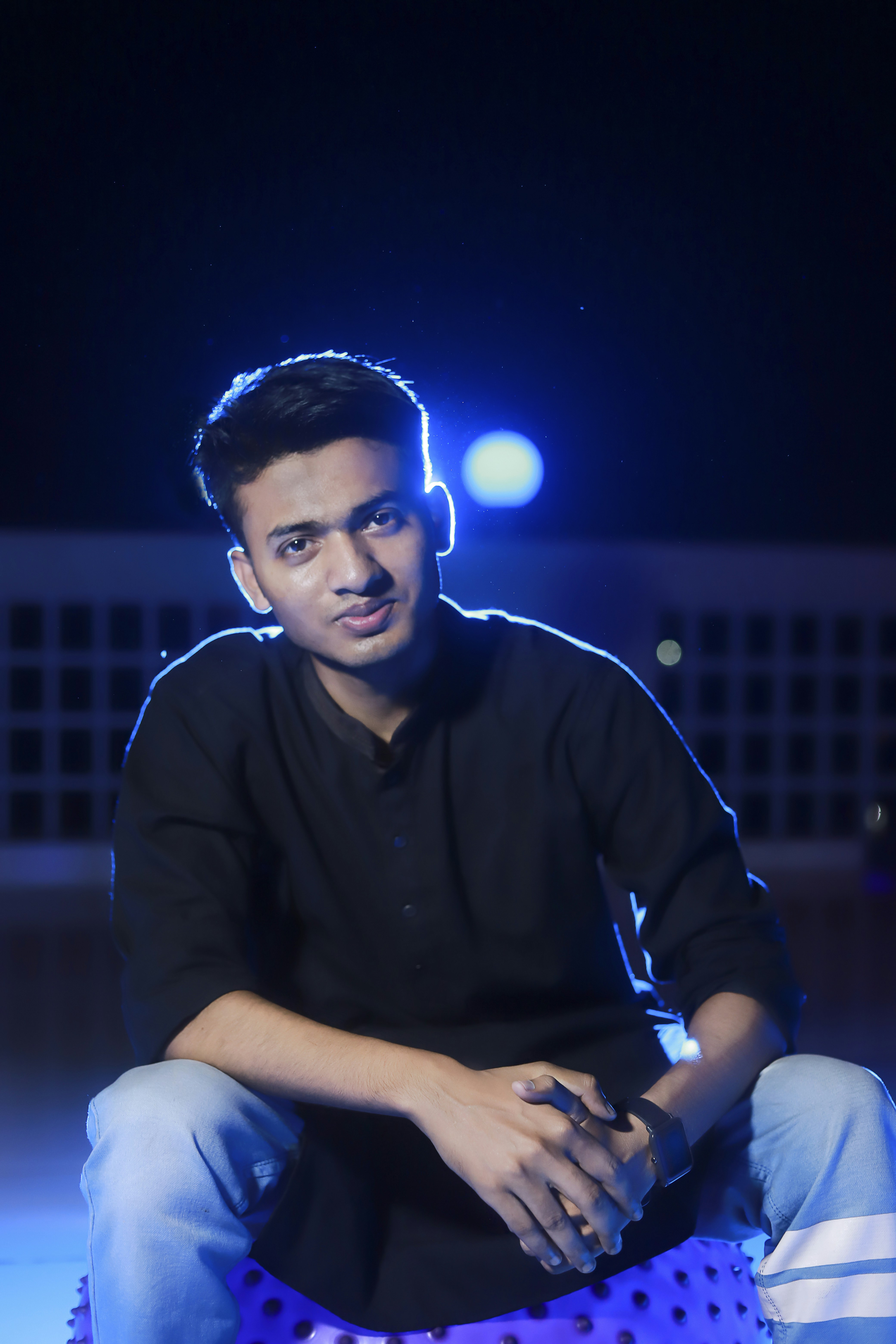 a man sitting on a chair