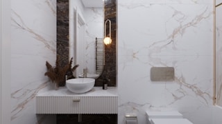 a bathroom with a sink and mirror