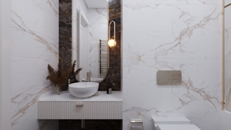 a bathroom with a sink and mirror