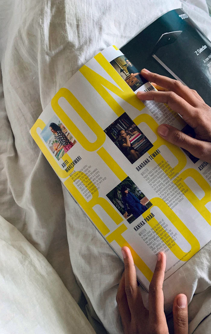Magazine spread with yellow typography