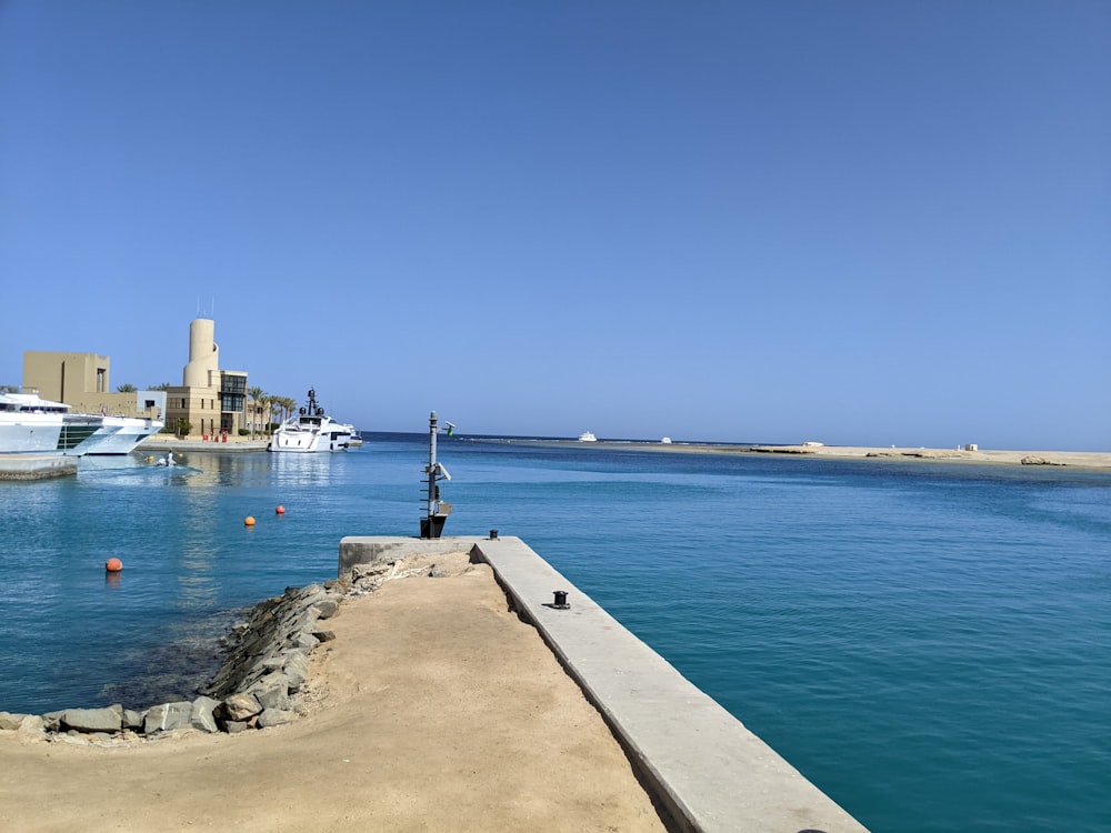 a dock with boats in the water