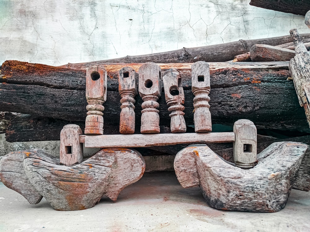 a wooden structure with a few logs