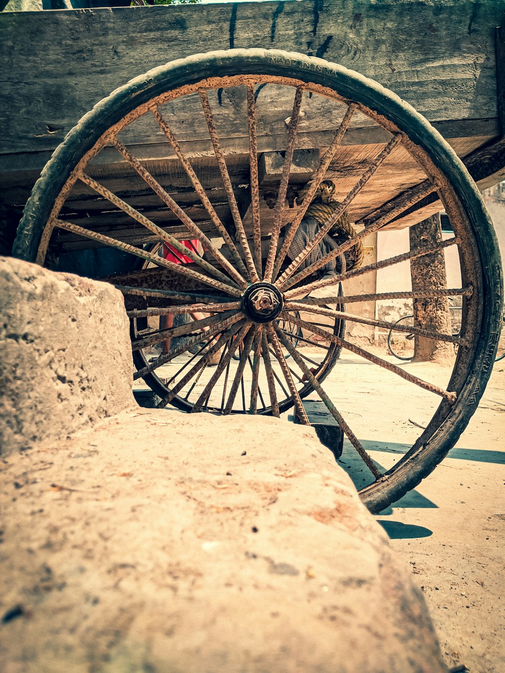 a wheel on a rock