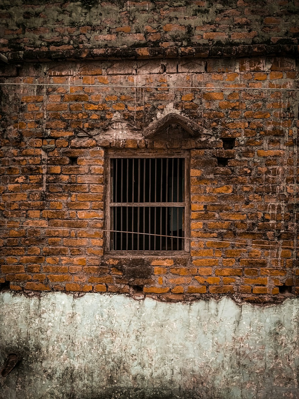 a window in a brick building